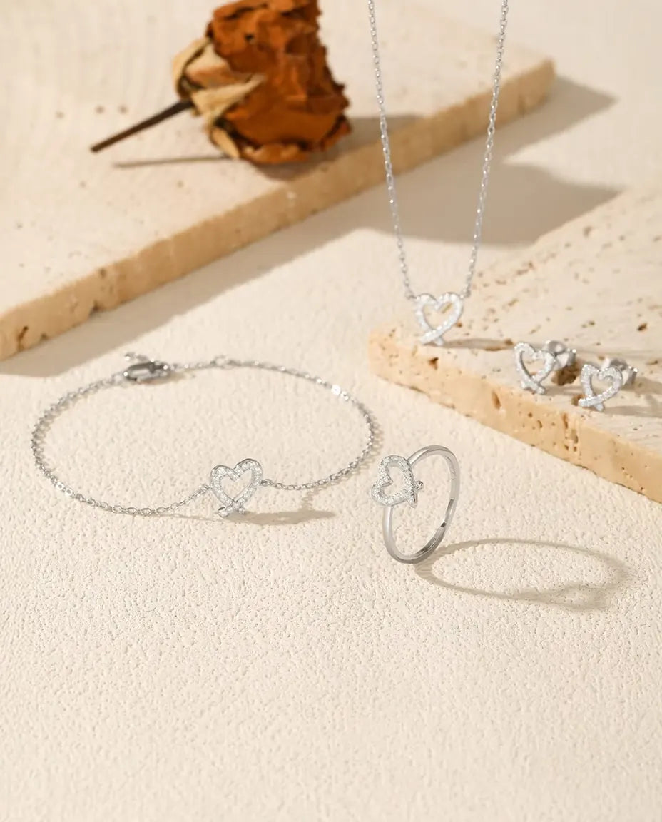 Moissanite open heart jewellery set in 925 sterling silver: necklace, bracelet, ring and stud earrings