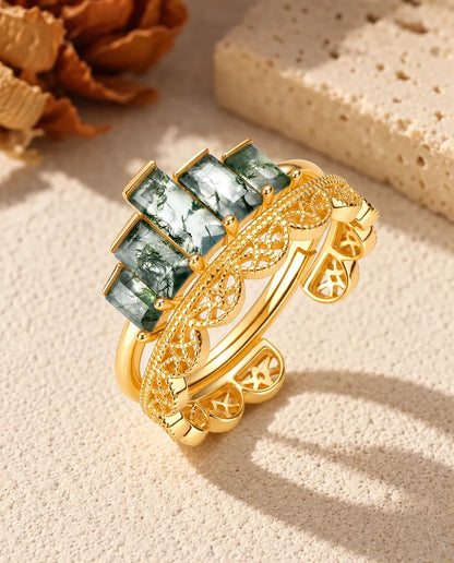 Moss Agate Stacking Ring Set in Gold Plated 925 Sterling Silver - the two rings stacked together on a cream textured surface