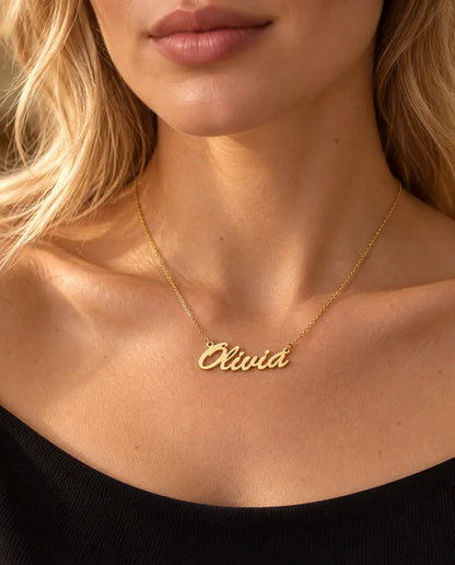 Personalised Brush Script Name Necklace in 925 Sterling Silver - Custom Nameplate - worn on a model in gold