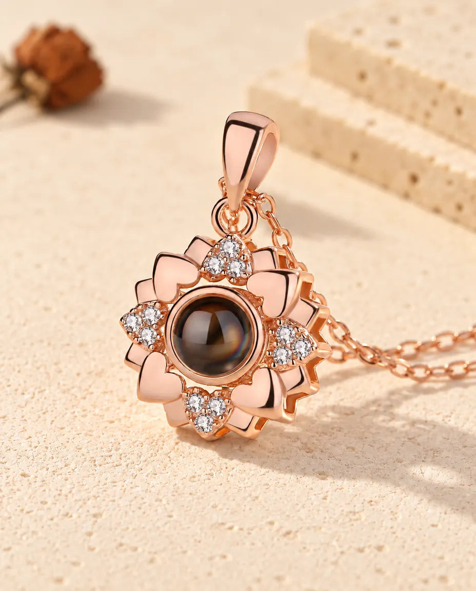 Personalised rose gold tone heart flower photo projection necklace with cubic zirconia on cream plaster